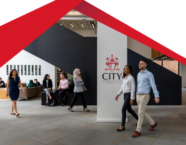 Students and staff walking in the Foyer at Northampton Square.