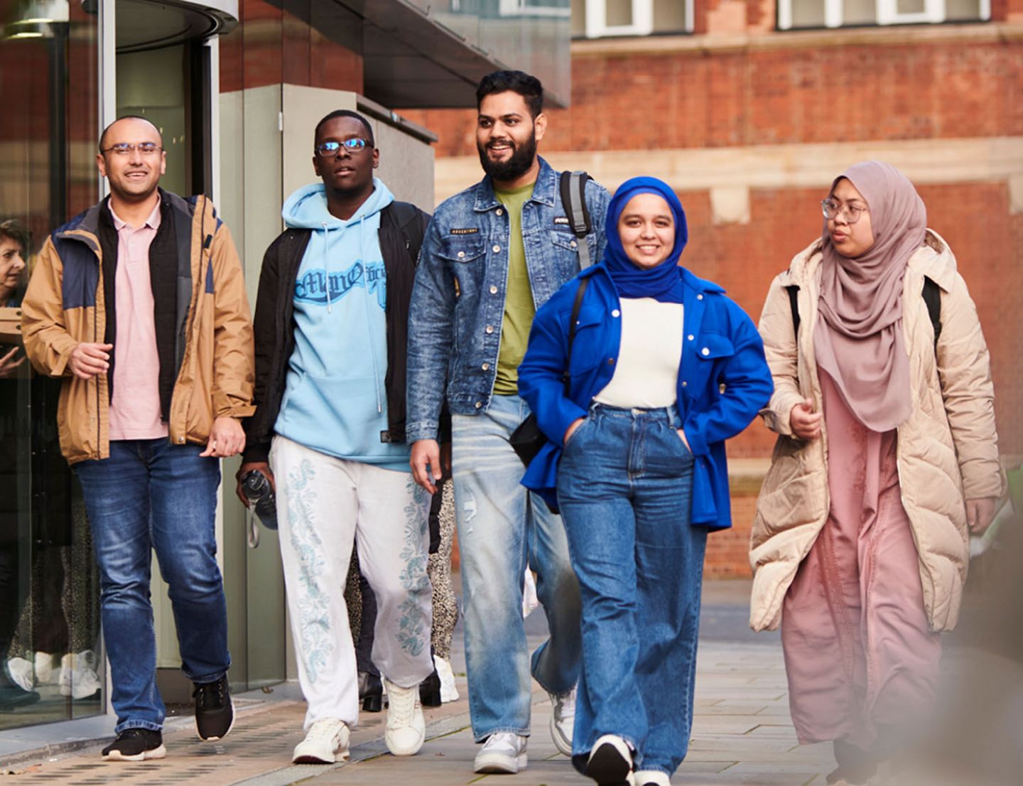 Students walking towards Rhind Building