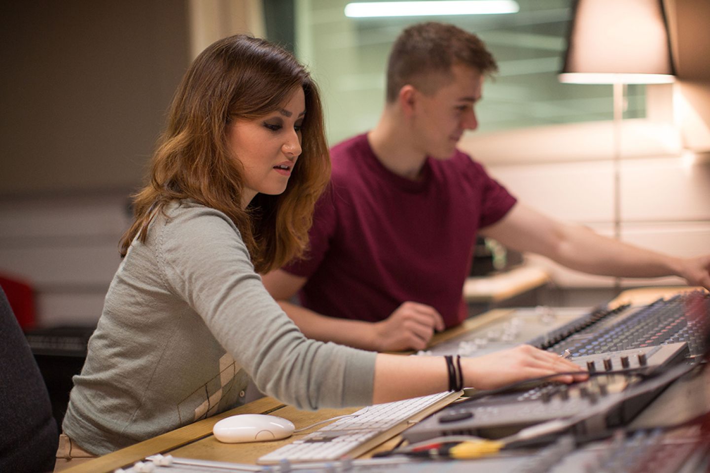Two students using the radio studios