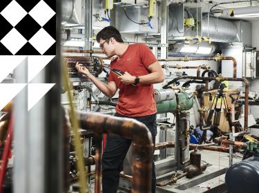 Man working in a machine lab