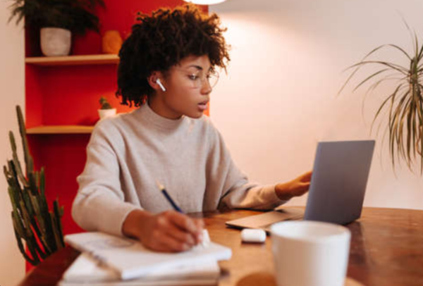 a student studying on a computer.