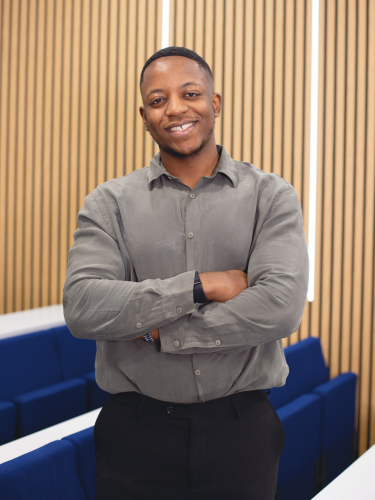 Student Malone standing in a lecture theatre 