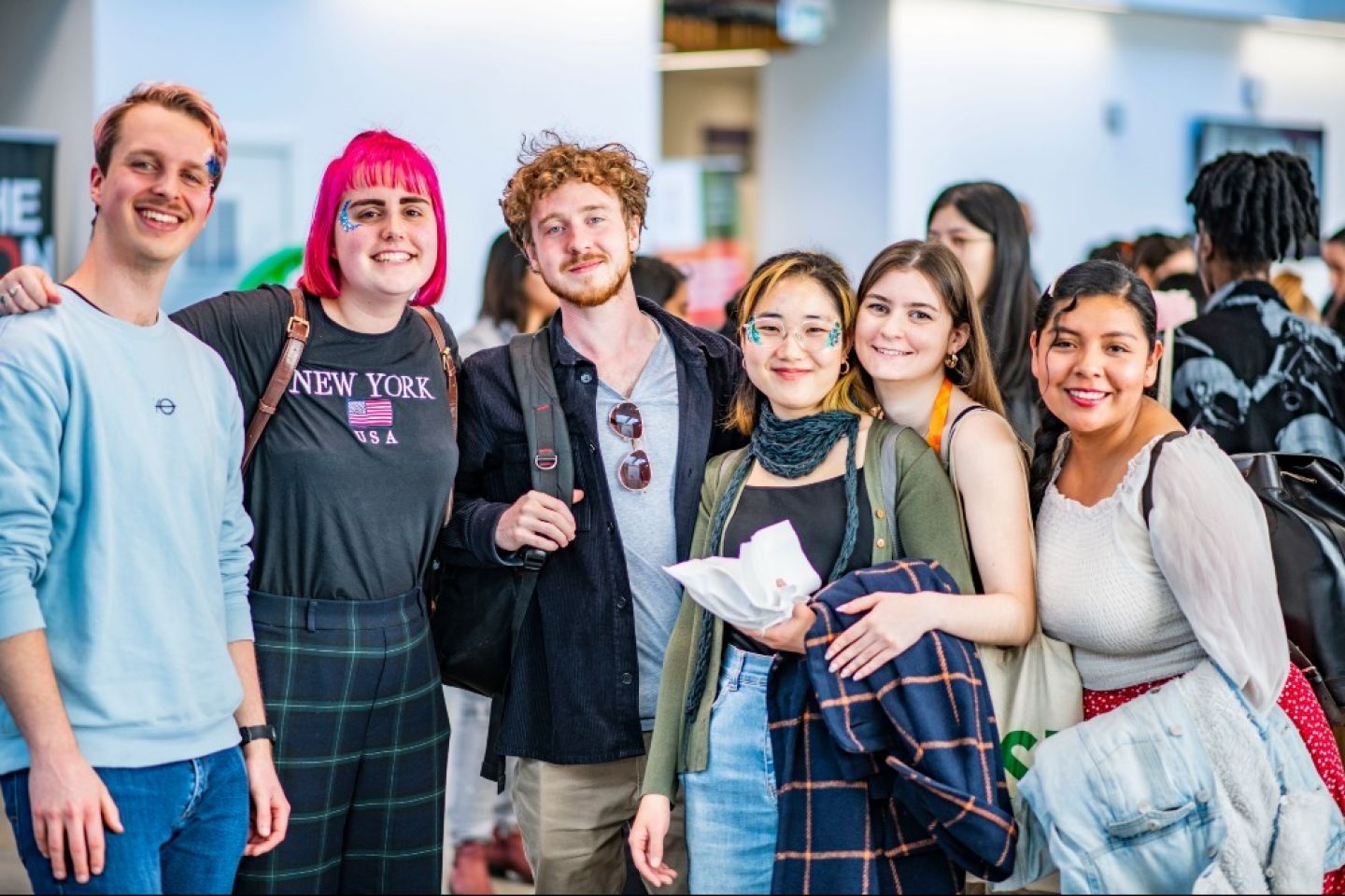 A group of students smiling at the camera